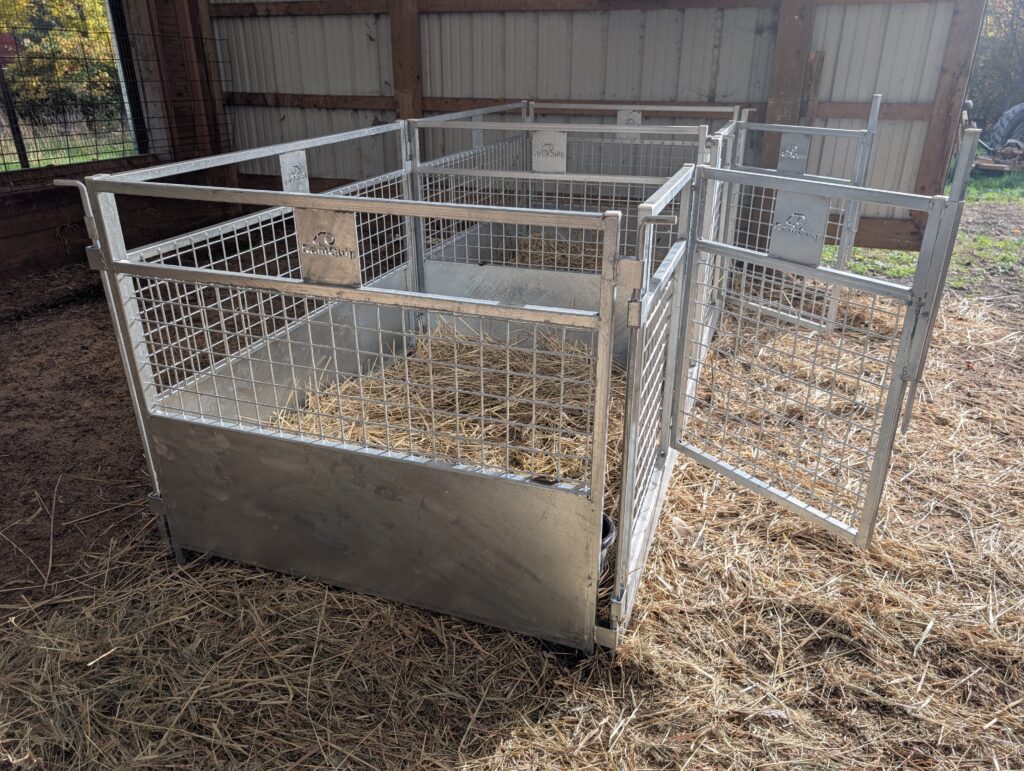 Lambing and kidding pens set up in a barn — example 1